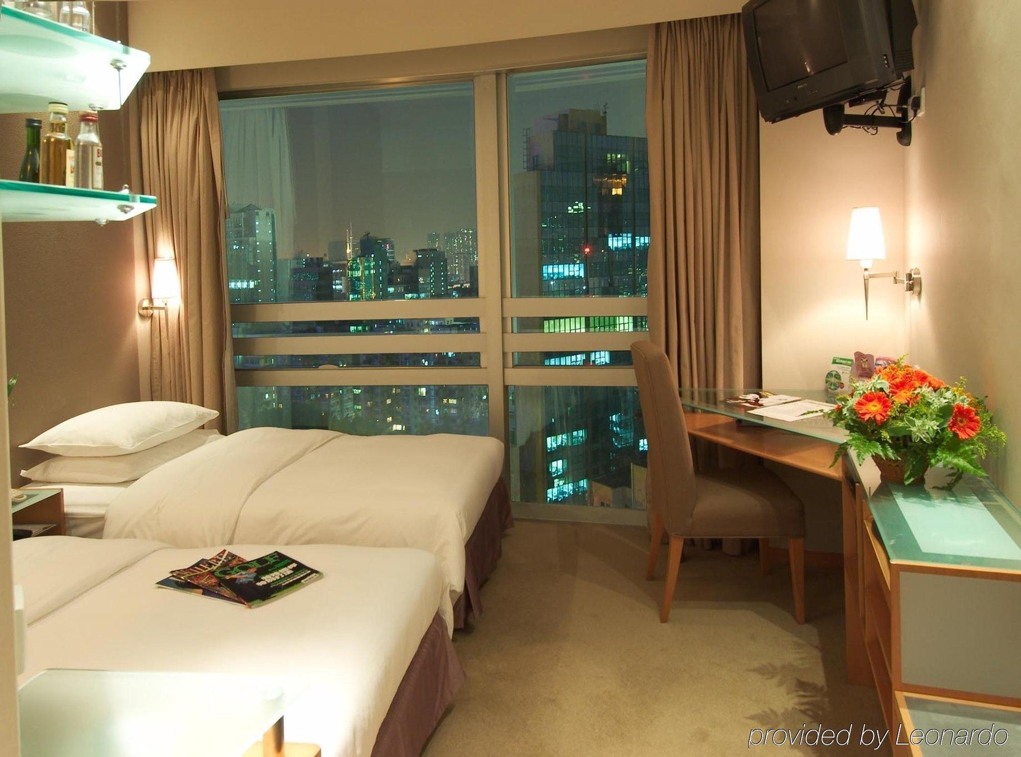 The Empire Hotel Kowloon - Tsim Sha Tsui Hongkong Rum bild